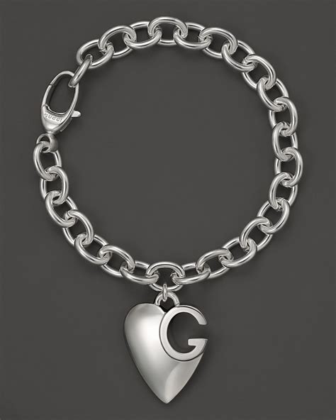 gucci silver heart charm bracelet|gucci trademark charm bracelet.